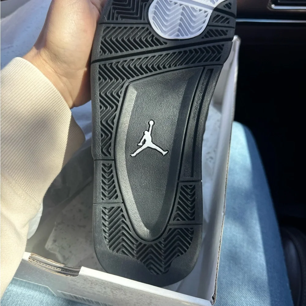 Jordan Men’s Black and White Air Retro Sneaker